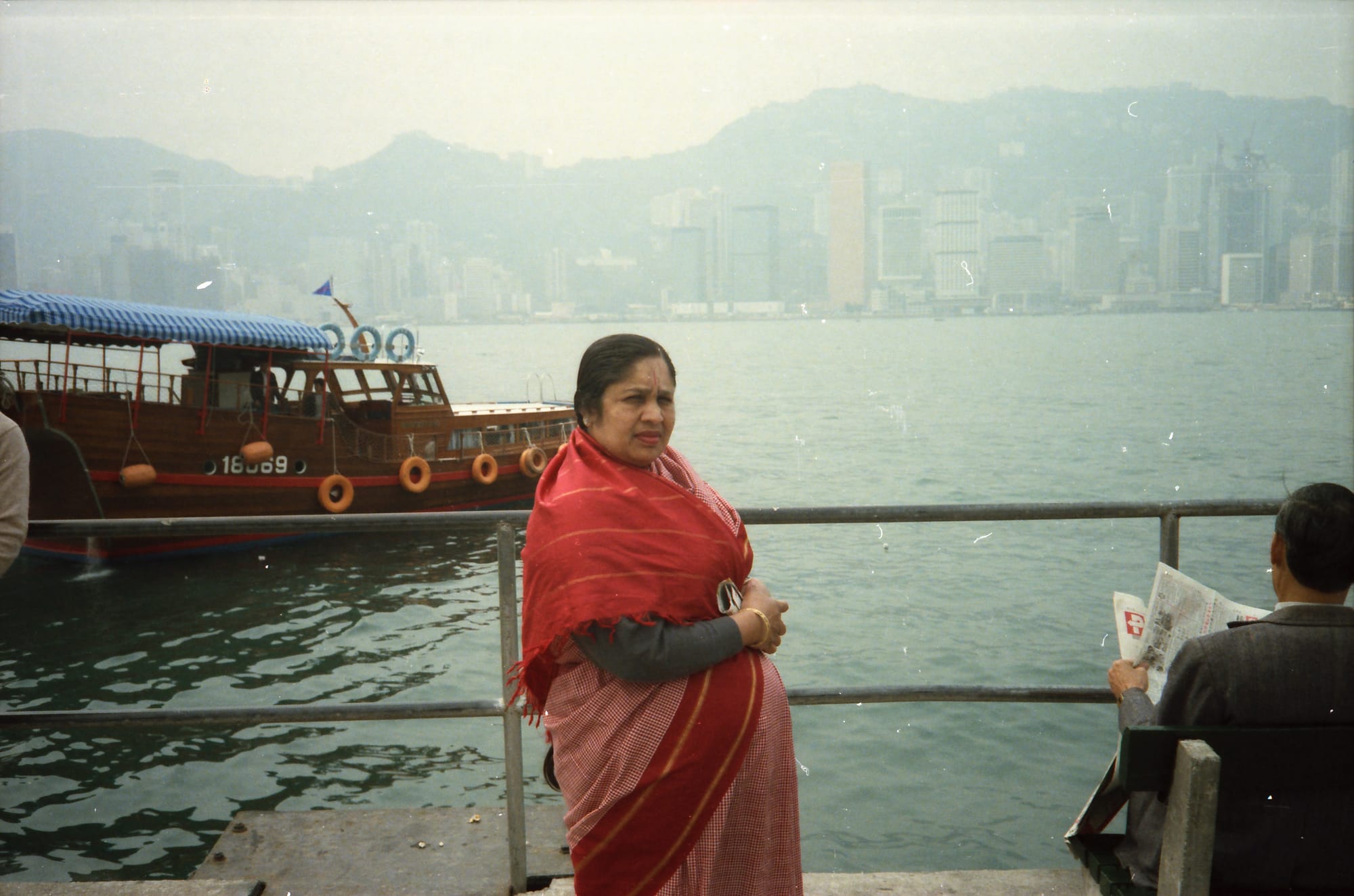 Mataji at the rail. Victoria Harbour, Hong Kong