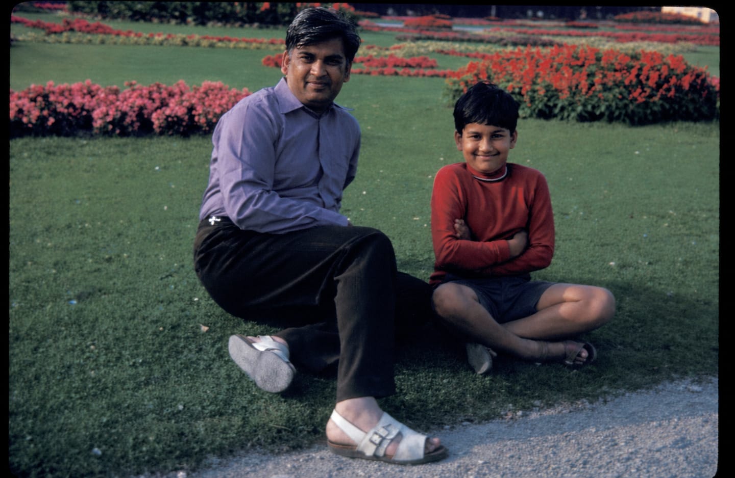Papaji and me on a lawn. Continental Europe, city unknown