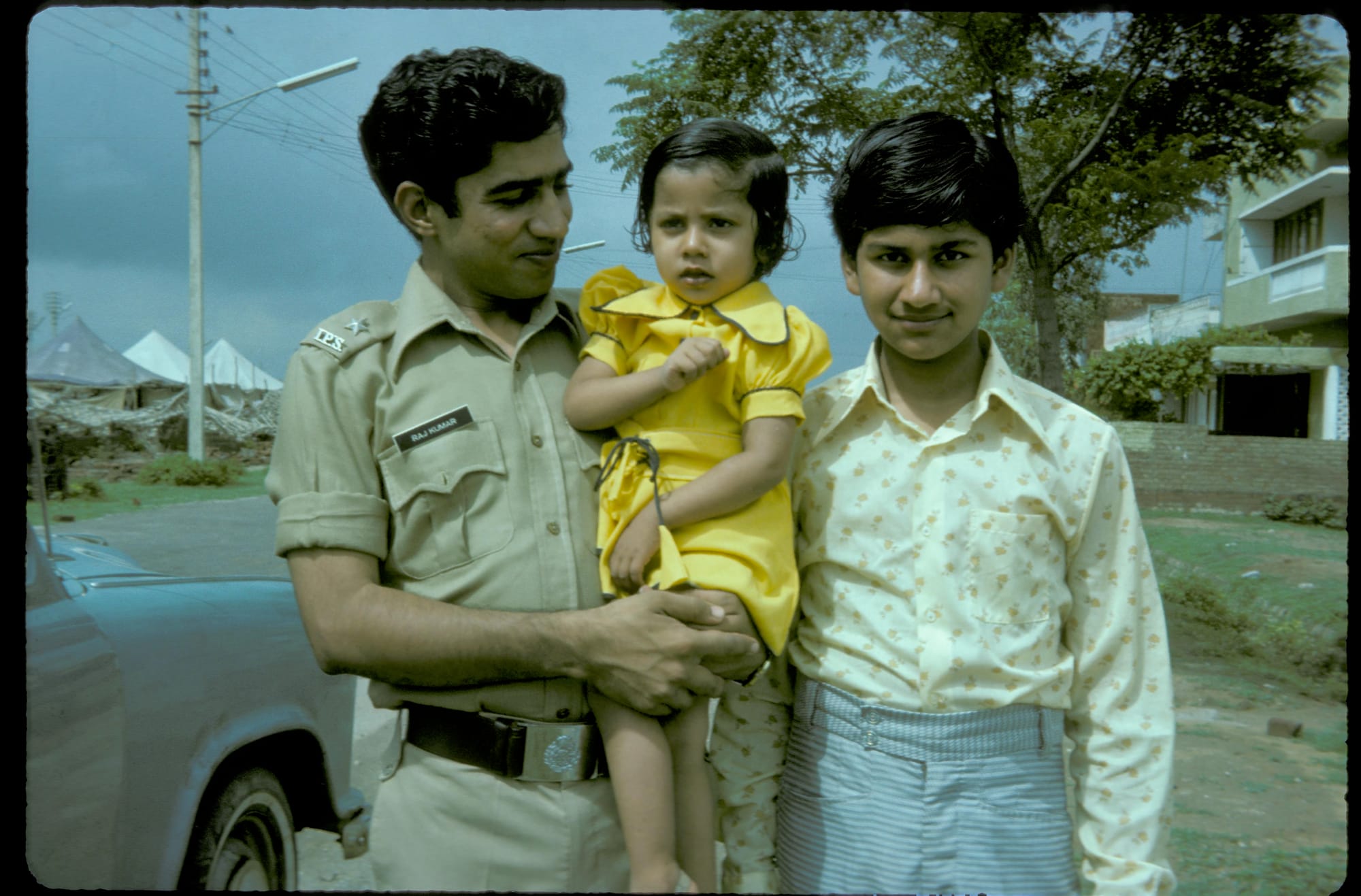 Raj Kumar, Sunil and a small child. India