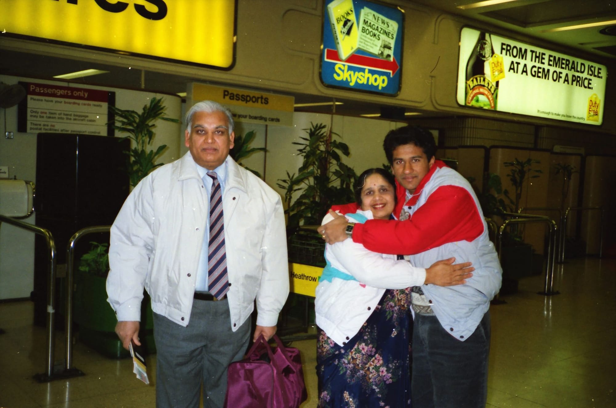 Three people. Heathrow Airport